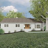 a house with huge green field in front of it