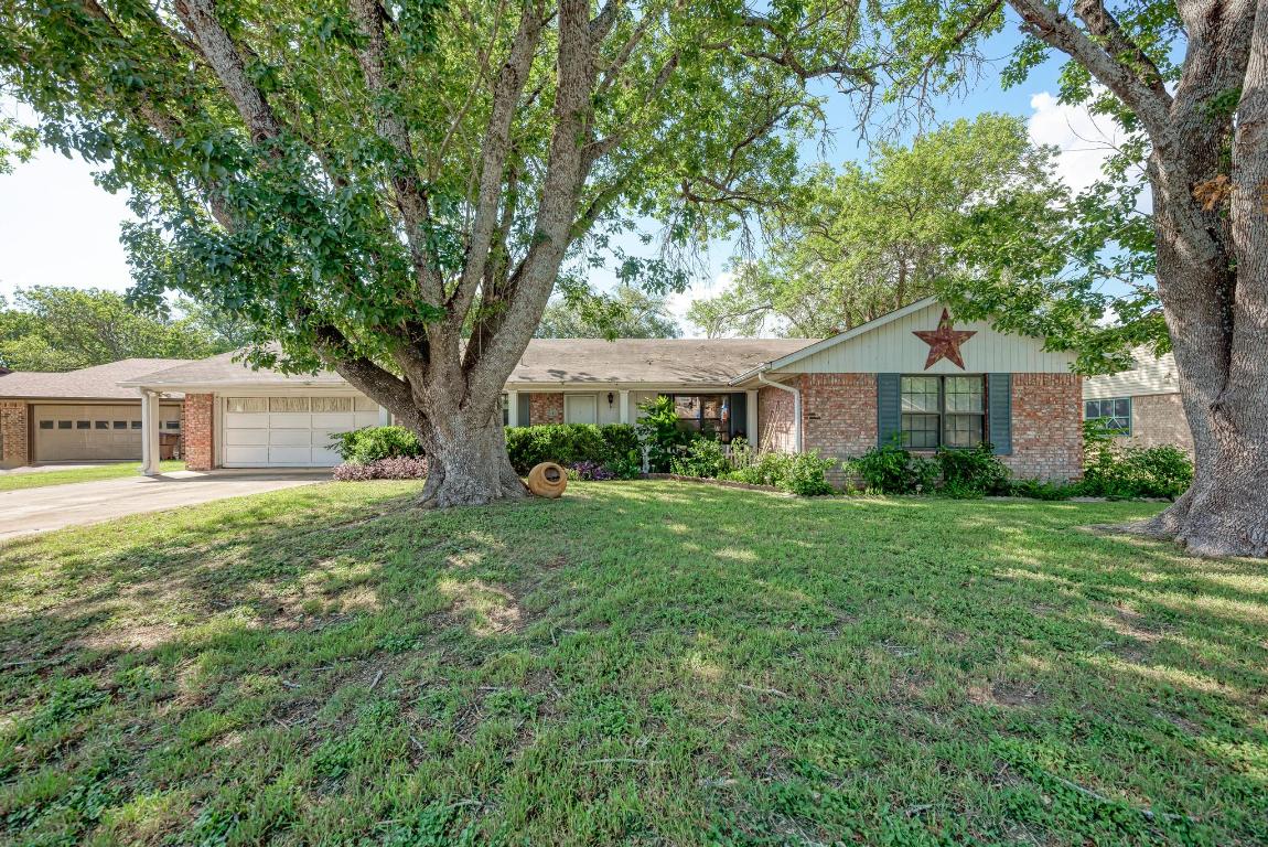 807 Ross Circle Lockhart, TX 78644 - Photo 1 of 1 a front view of house with yard and green space