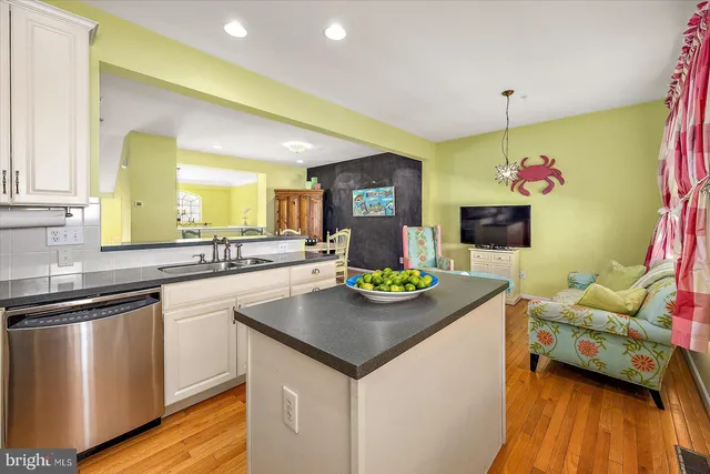 a view of a two chairs in the balcony