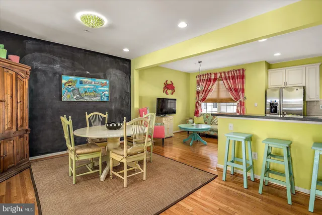a bathroom with a granite countertop sink mirror and shower