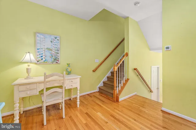 a view of a garage with a bike and a car