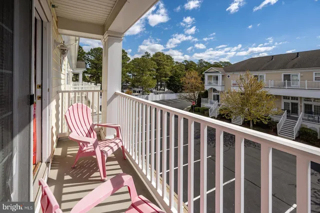an aerial view of residential building ocean and trees in ocean