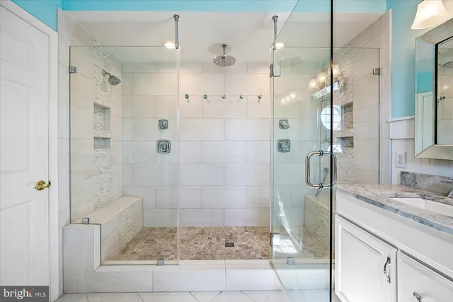 a view of a dining room with furniture and window