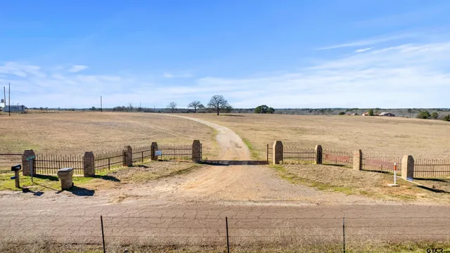 a view of a swimming pool and an ocean view