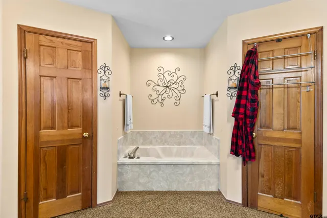 a view of storage and utility room with racks on the wall