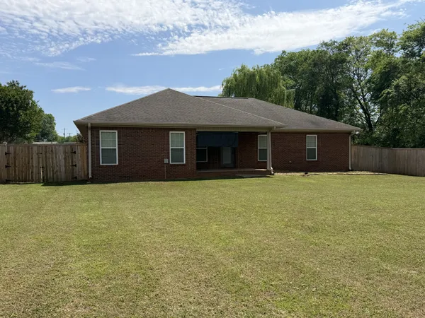 a front view of house with yard
