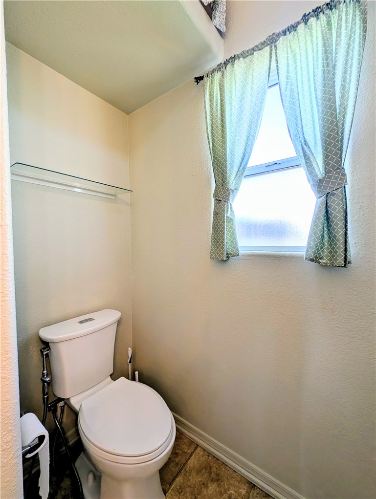 2000 Ramar Road, Unit 308 Bullhead City, AZ 86442 - Photo 19 of 27 Bathroom with baseboards and toilet