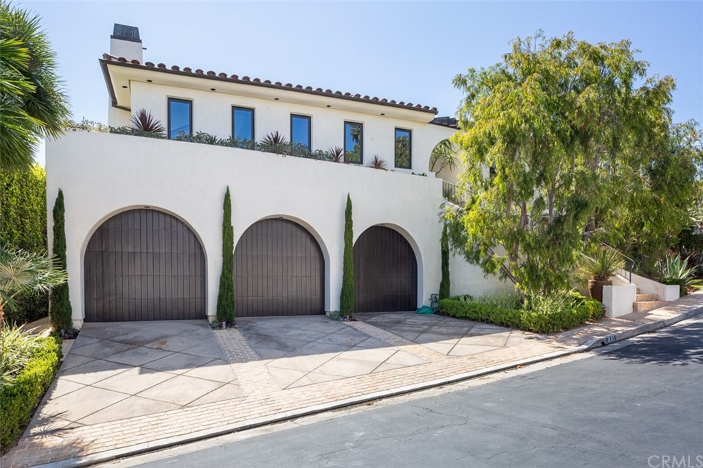 841 Emerald Bay Laguna Beach, CA 92651 - Photo 2 of 31 a front view of a house with garden