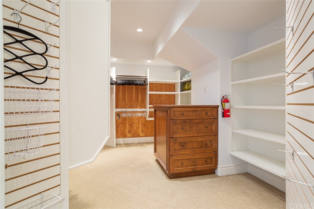 841 Emerald Bay Laguna Beach, CA 92651 - Photo 21 of 31 a view of walk in closet with clothes