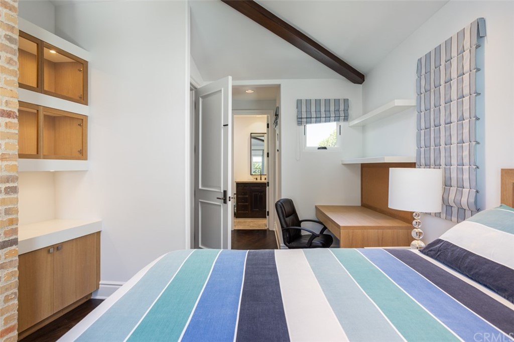 841 Emerald Bay Laguna Beach, CA 92651 - Photo 24 of 31 a bedroom with bed and wooden floor