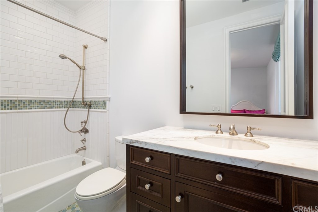 841 Emerald Bay Laguna Beach, CA 92651 - Photo 28 of 31 a bathroom with a sink a toilet and shower