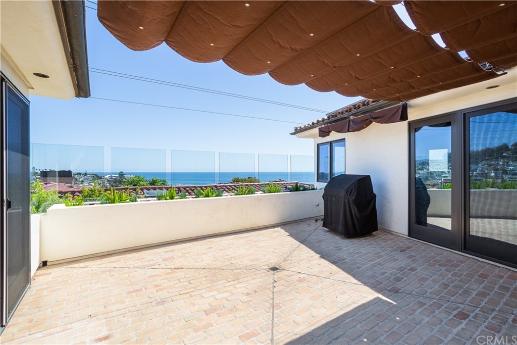 841 Emerald Bay Laguna Beach, CA 92651 - Photo 6 of 31 a view of a room with wooden floor