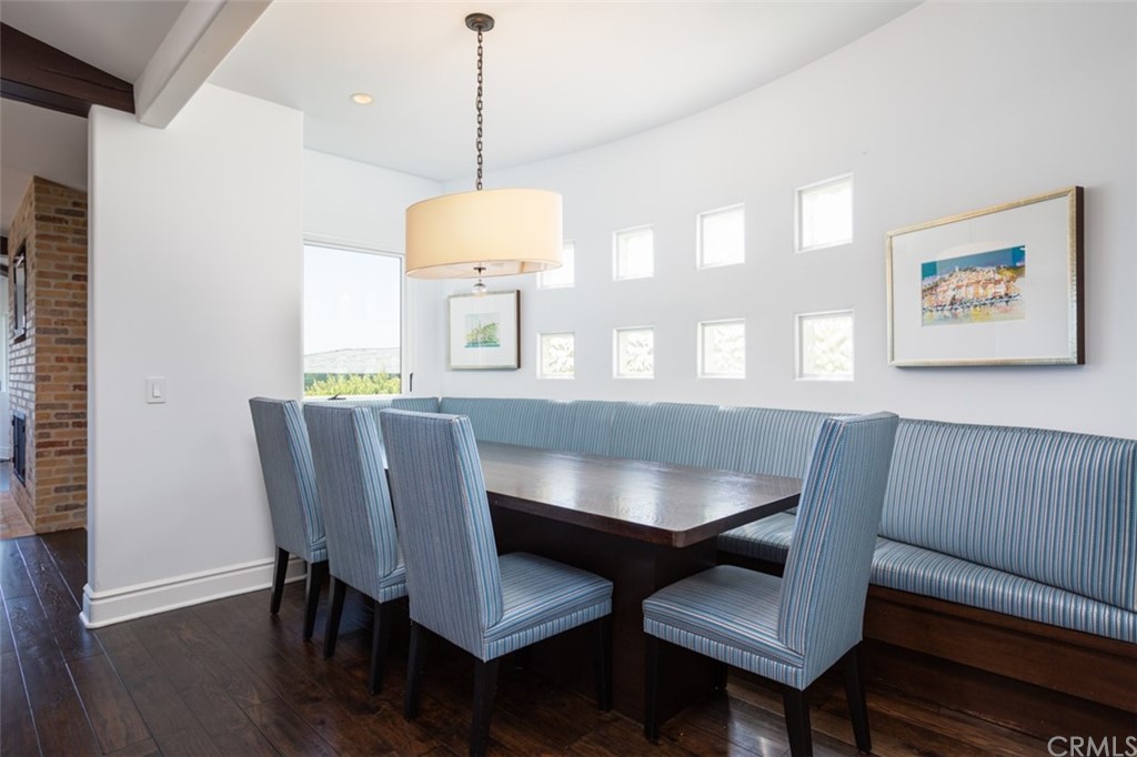 841 Emerald Bay Laguna Beach, CA 92651 - Photo 10 of 31 a view of a dining room with furniture window and wooden floor