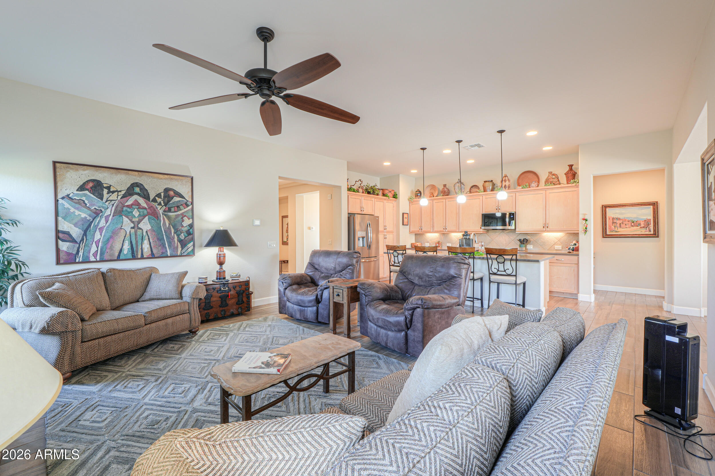 5048 North Scottsdale Road Eloy, AZ 85131 - Photo 18 of 53 a living room with furniture and a view of kitchen
