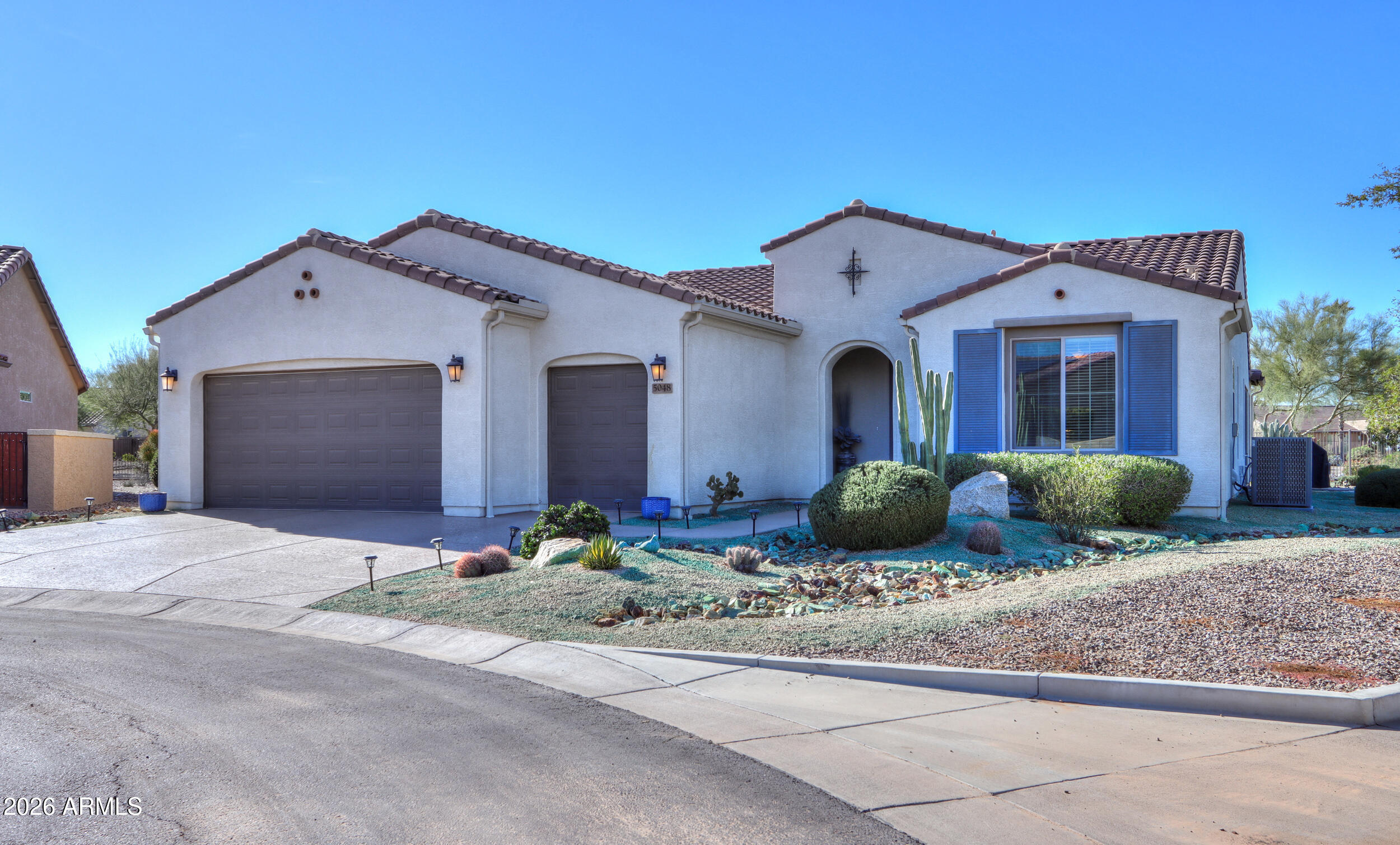 5048 North Scottsdale Road Eloy, AZ 85131 - Photo 4 of 53 a front view of a house with windows