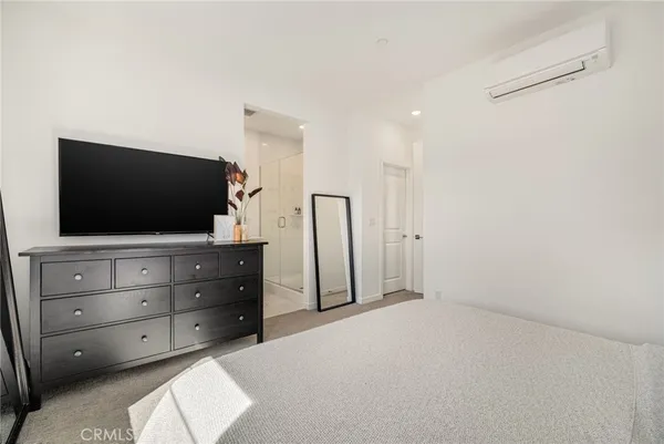 a view of room with flat screen tv
