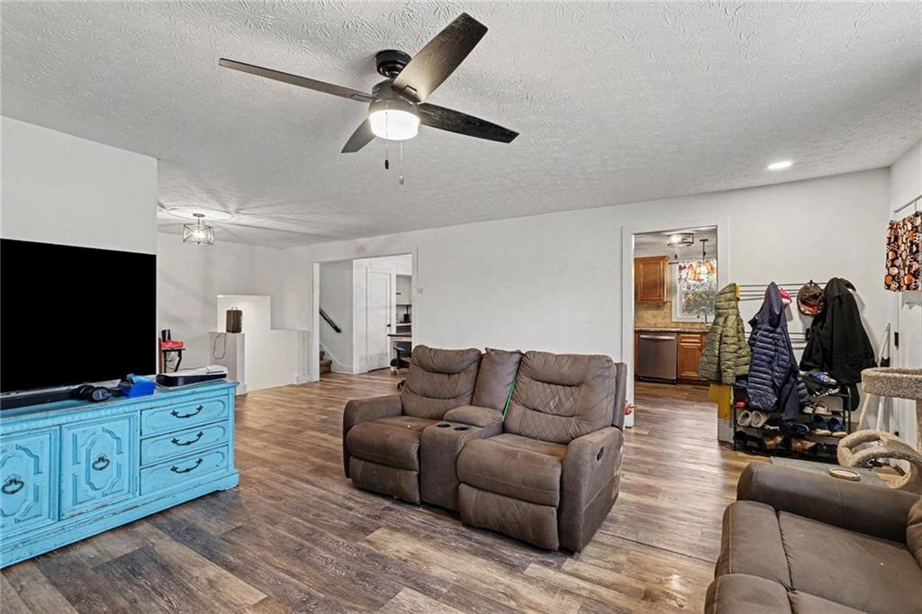 221 Rome Street Temple, GA 30179 - Photo 11 of 30 a living room with furniture and a flat screen tv