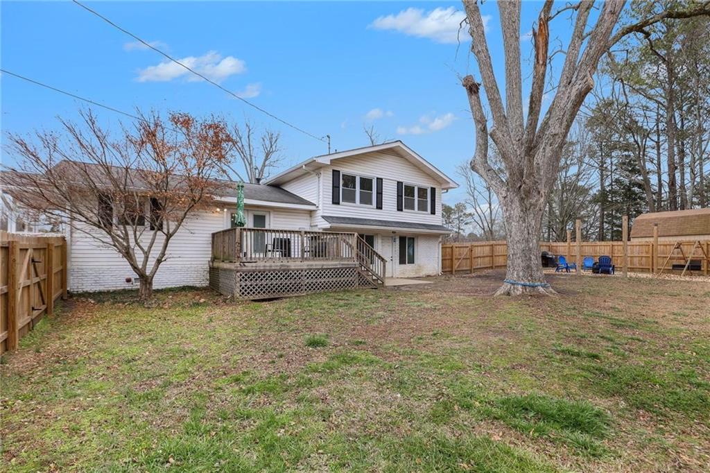 221 Rome Street Temple, GA 30179 - Photo 27 of 30 a house that has a tree in front of it