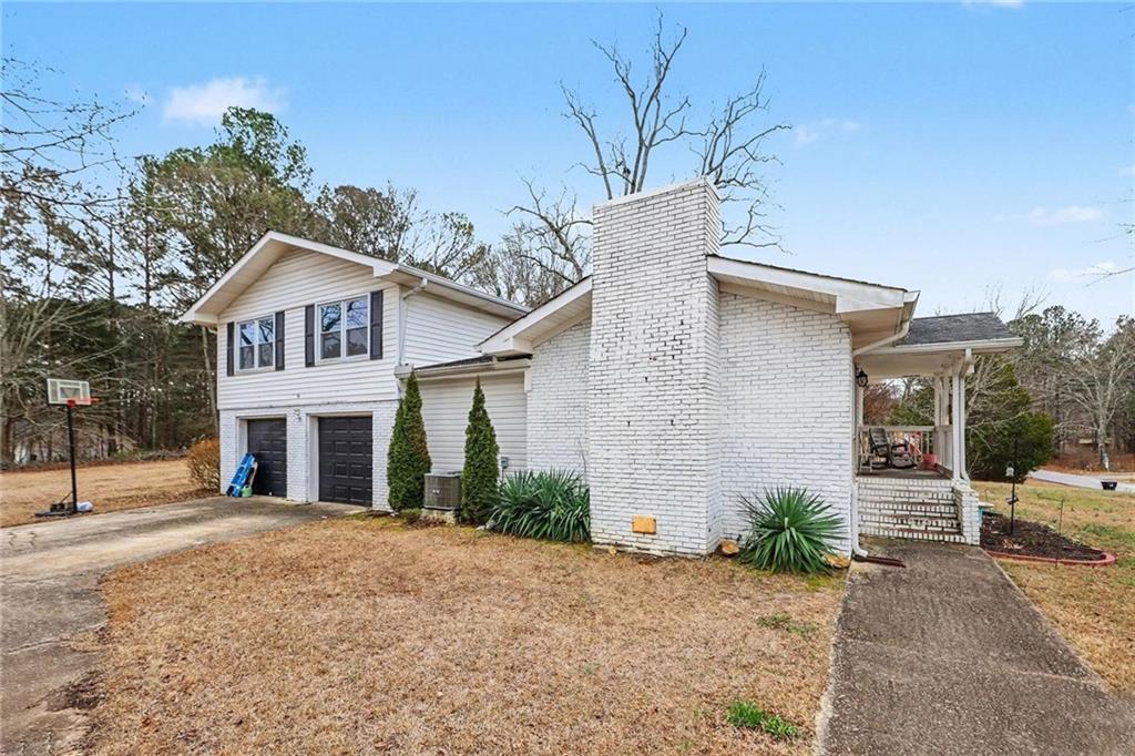 221 Rome Street Temple, GA 30179 - Photo 3 of 30 a front view of a house with a yard