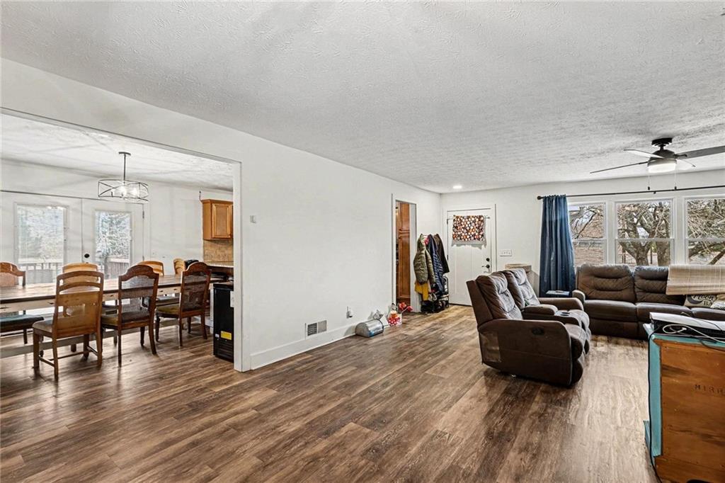 221 Rome Street Temple, GA 30179 - Photo 7 of 30 a living room with furniture and wooden floor