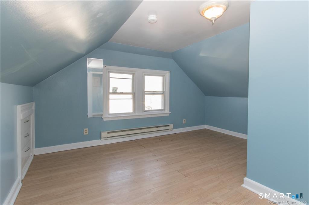 18 Lawrence Street Norwalk, CT 06854 - Photo 28 of 31 an empty room with windows