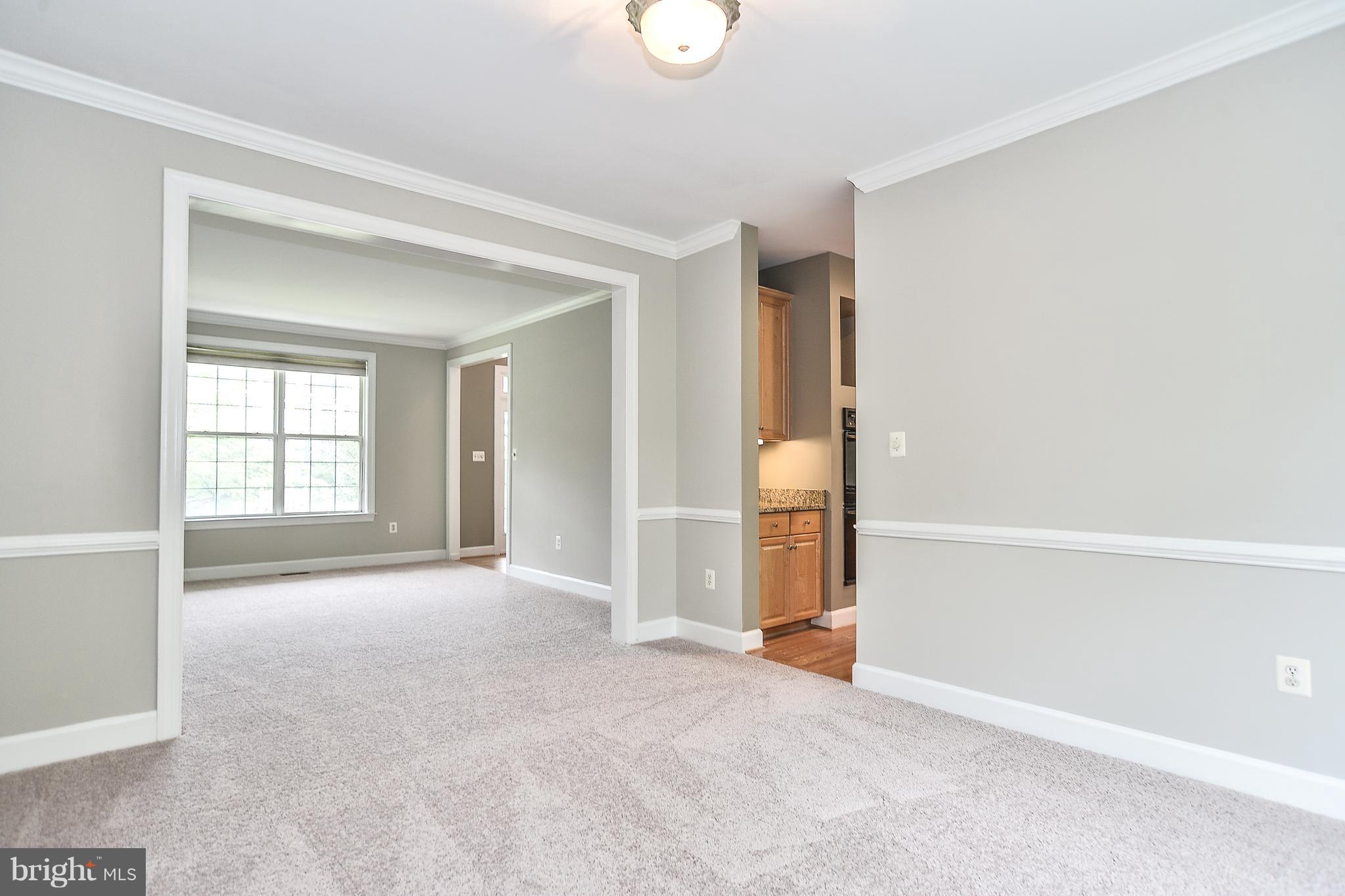 3910 Pender Spring Drive Fairfax, VA 22033 - Photo 7 of 29 Dining Room and Living Room