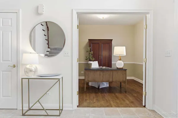 a room with wooden floor and window