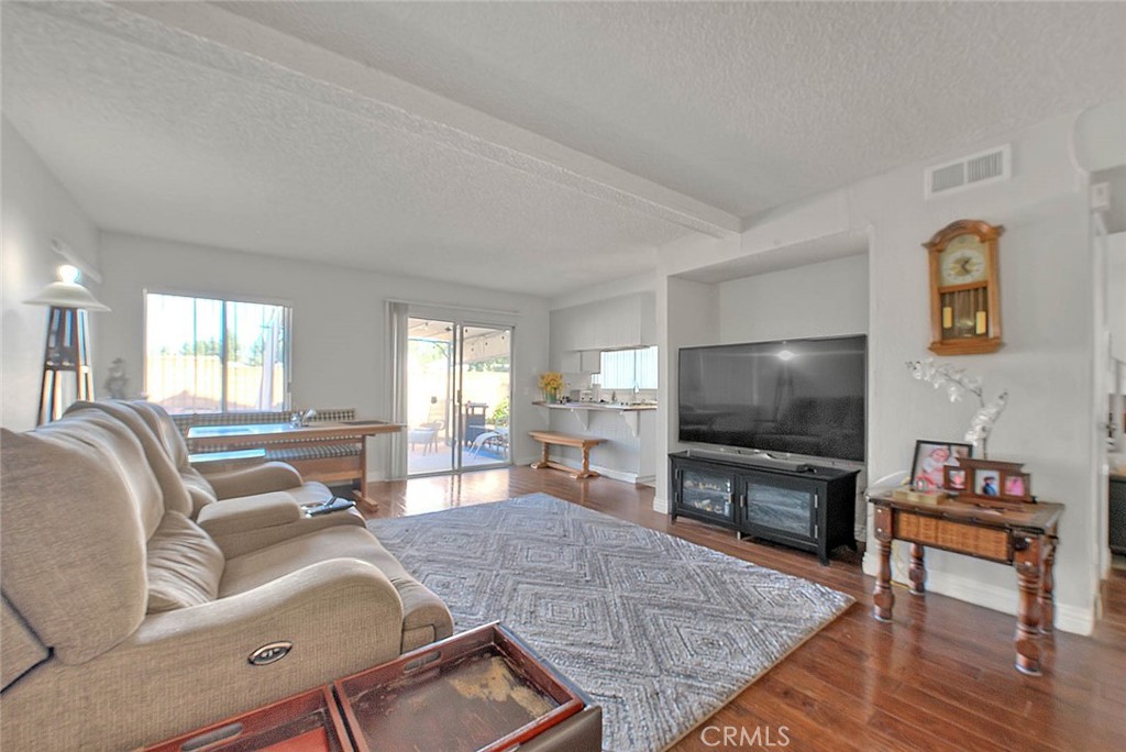 8 Tanglewood Drive Phillips Ranch, CA 91766 - Photo 11 of 71 a living room with furniture and a flat screen tv