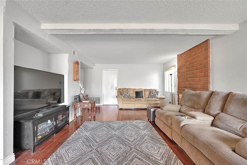 8 Tanglewood Drive Phillips Ranch, CA 91766 - Photo 14 of 71 a living room with furniture and a flat screen tv