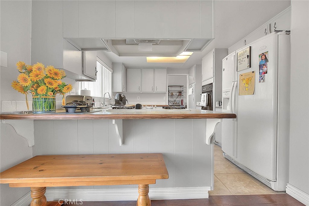 8 Tanglewood Drive Phillips Ranch, CA 91766 - Photo 17 of 71 a kitchen with stainless steel appliances granite countertop a refrigerator and a sink