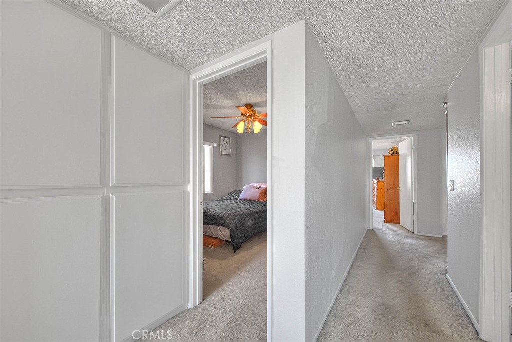 8 Tanglewood Drive Phillips Ranch, CA 91766 - Photo 27 of 71 a view of a bedroom from a hallway