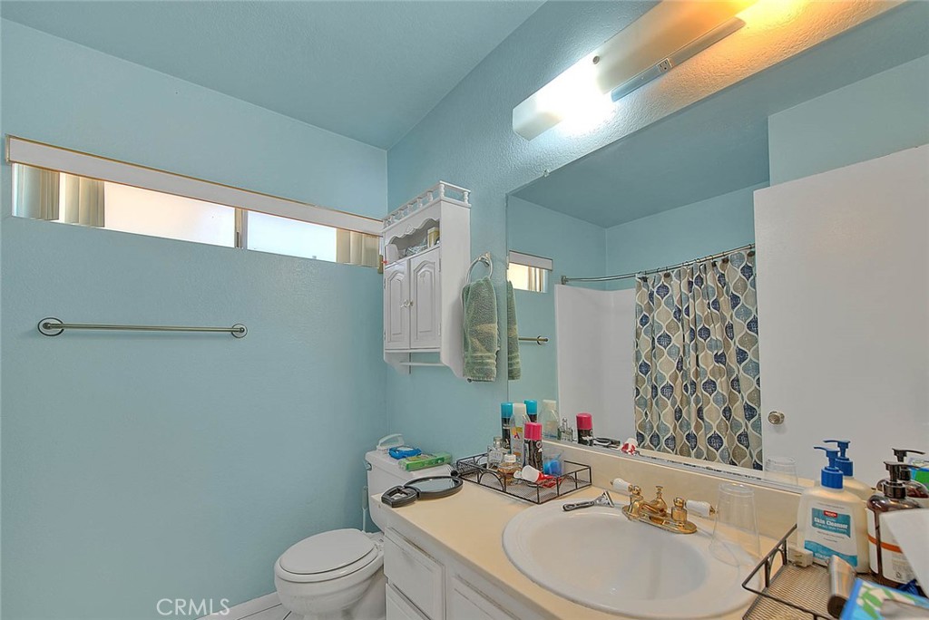 8 Tanglewood Drive Phillips Ranch, CA 91766 - Photo 29 of 71 a bathroom with a sink toilet and shower