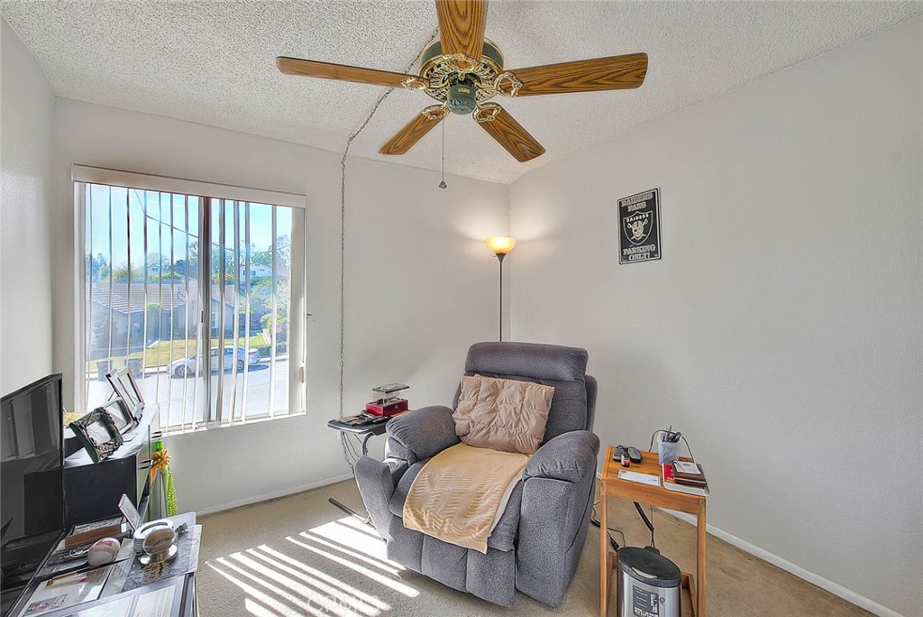 8 Tanglewood Drive Phillips Ranch, CA 91766 - Photo 36 of 71 a living room with furniture and a window