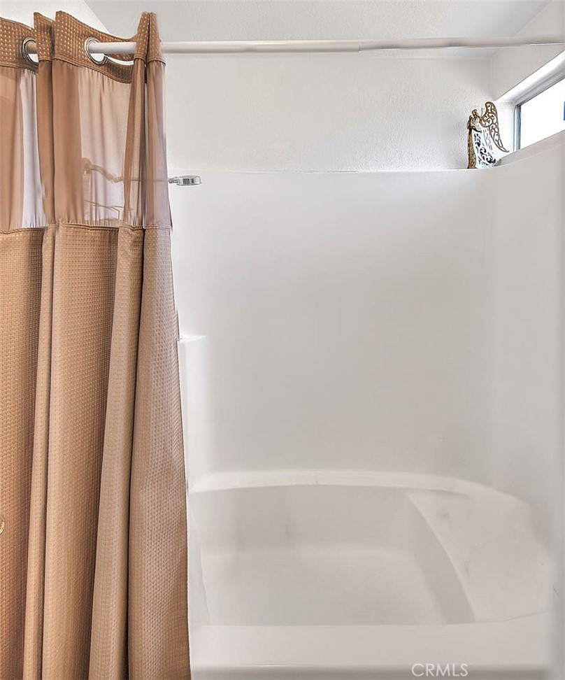 8 Tanglewood Drive Phillips Ranch, CA 91766 - Photo 44 of 71 a bathroom with a shower