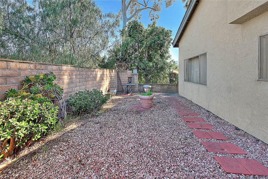 8 Tanglewood Drive Phillips Ranch, CA 91766 - Photo 54 of 71 a backyard of a house with lots of green space