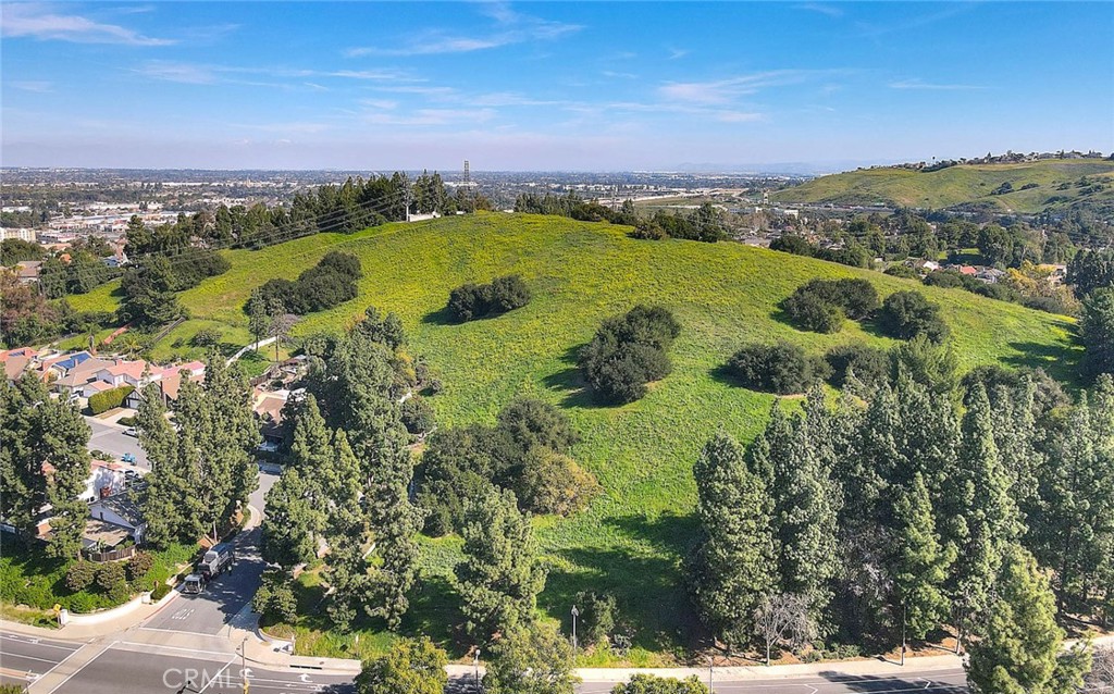 8 Tanglewood Drive Phillips Ranch, CA 91766 - Photo 65 of 71 a view of a city with mountains in the background