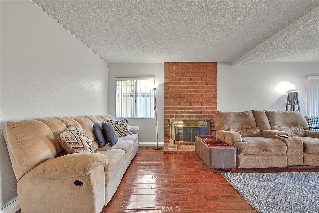 8 Tanglewood Drive Phillips Ranch, CA 91766 - Photo 10 of 71 a living room with furniture and a couch