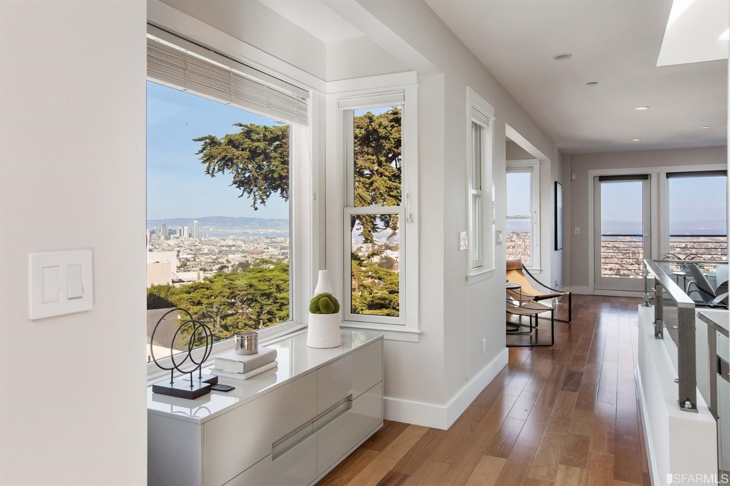 881 Corbett Avenue, Unit 3 San Francisco, CA 94131 - Photo 14 of 78 a living room with furniture and a large window