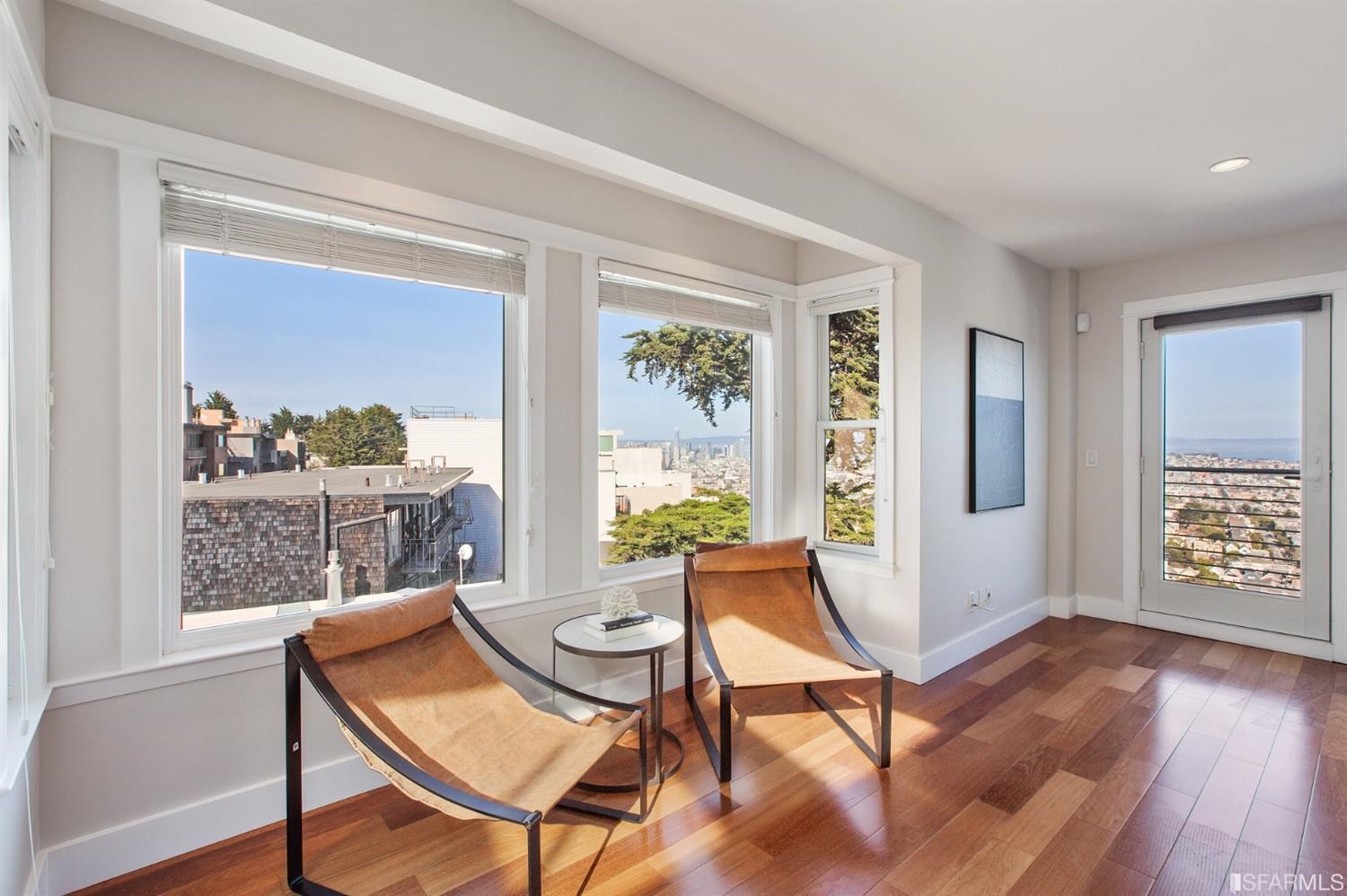 881 Corbett Avenue, Unit 3 San Francisco, CA 94131 - Photo 15 of 78 a view of a livingroom with furniture and wooden floor