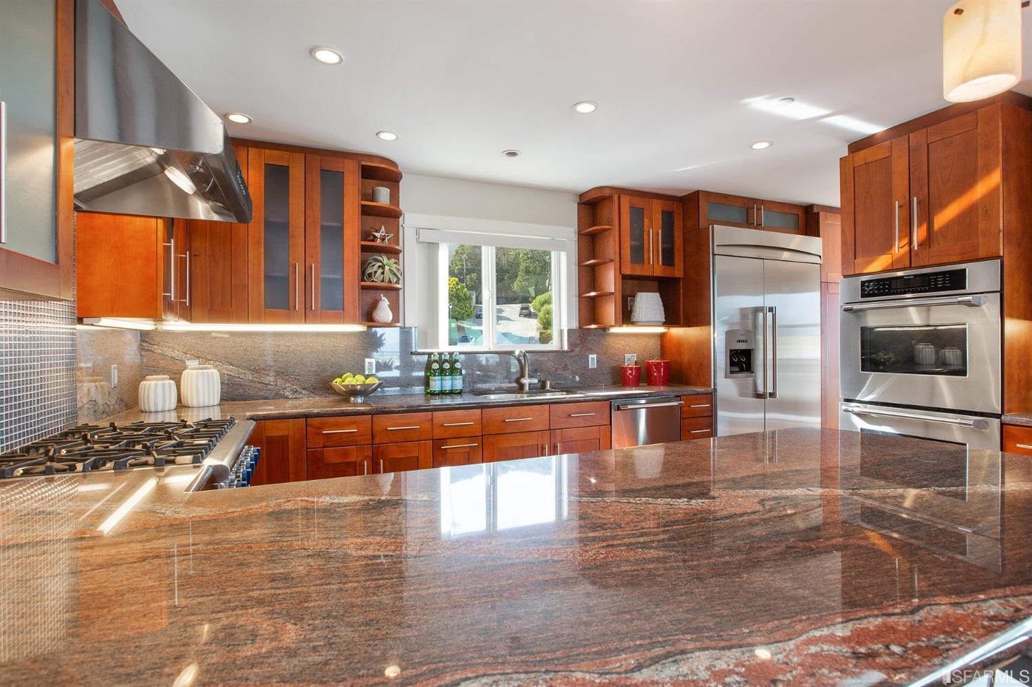 881 Corbett Avenue, Unit 3 San Francisco, CA 94131 - Photo 30 of 78 a kitchen with stainless steel appliances granite countertop a refrigerator and a stove top oven