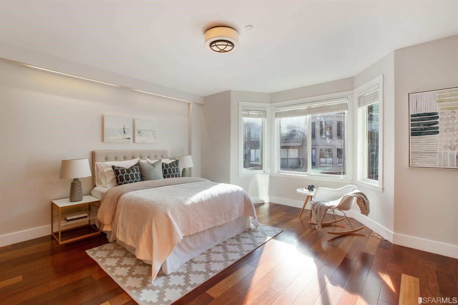 881 Corbett Avenue, Unit 3 San Francisco, CA 94131 - Photo 48 of 78 a bedroom with a bed and wooden floor