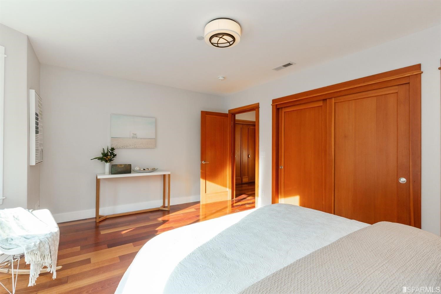 881 Corbett Avenue, Unit 3 San Francisco, CA 94131 - Photo 49 of 78 a bedroom with a bed and a window