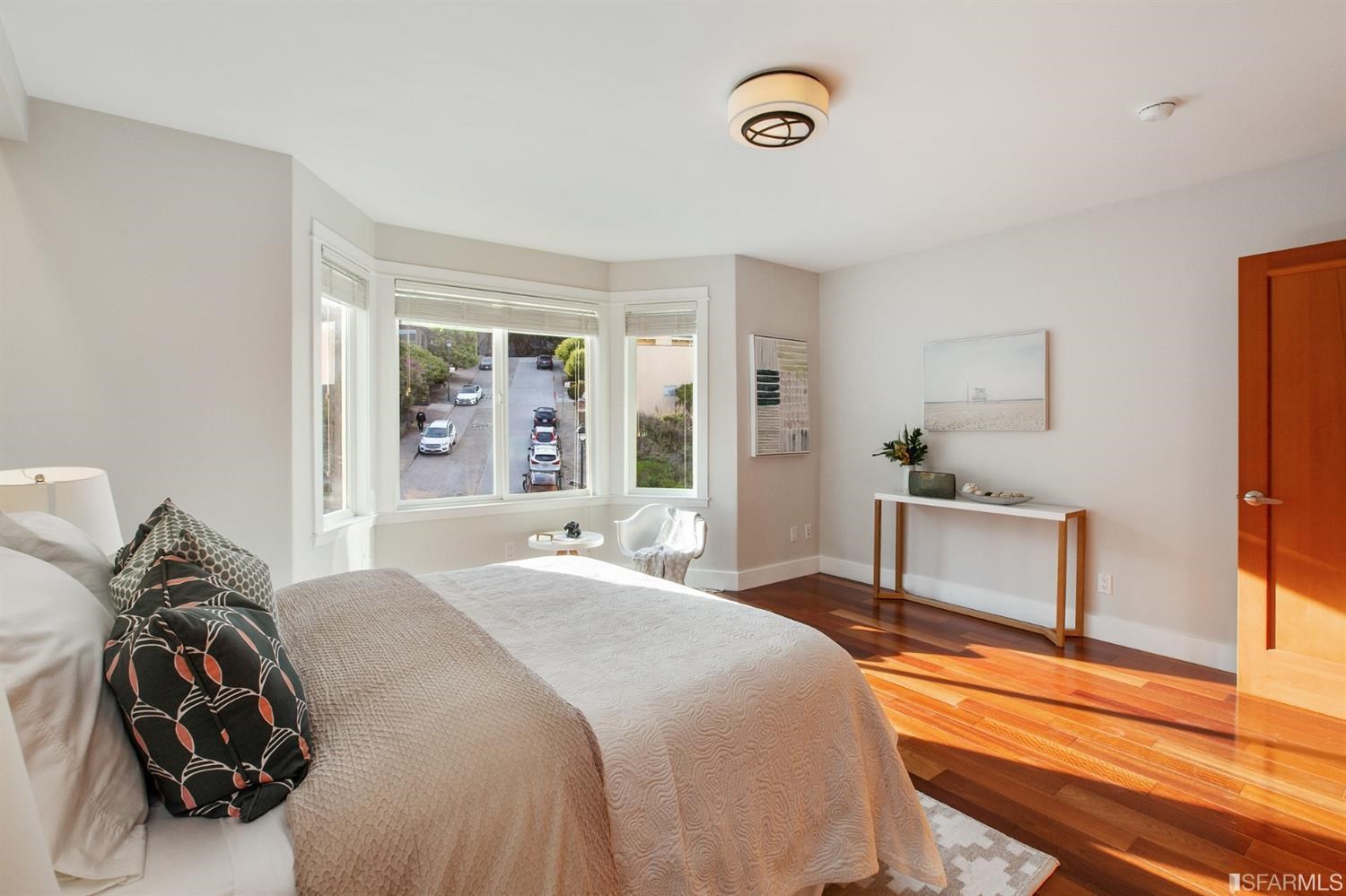 881 Corbett Avenue, Unit 3 San Francisco, CA 94131 - Photo 50 of 78 a bedroom with a bed and a window