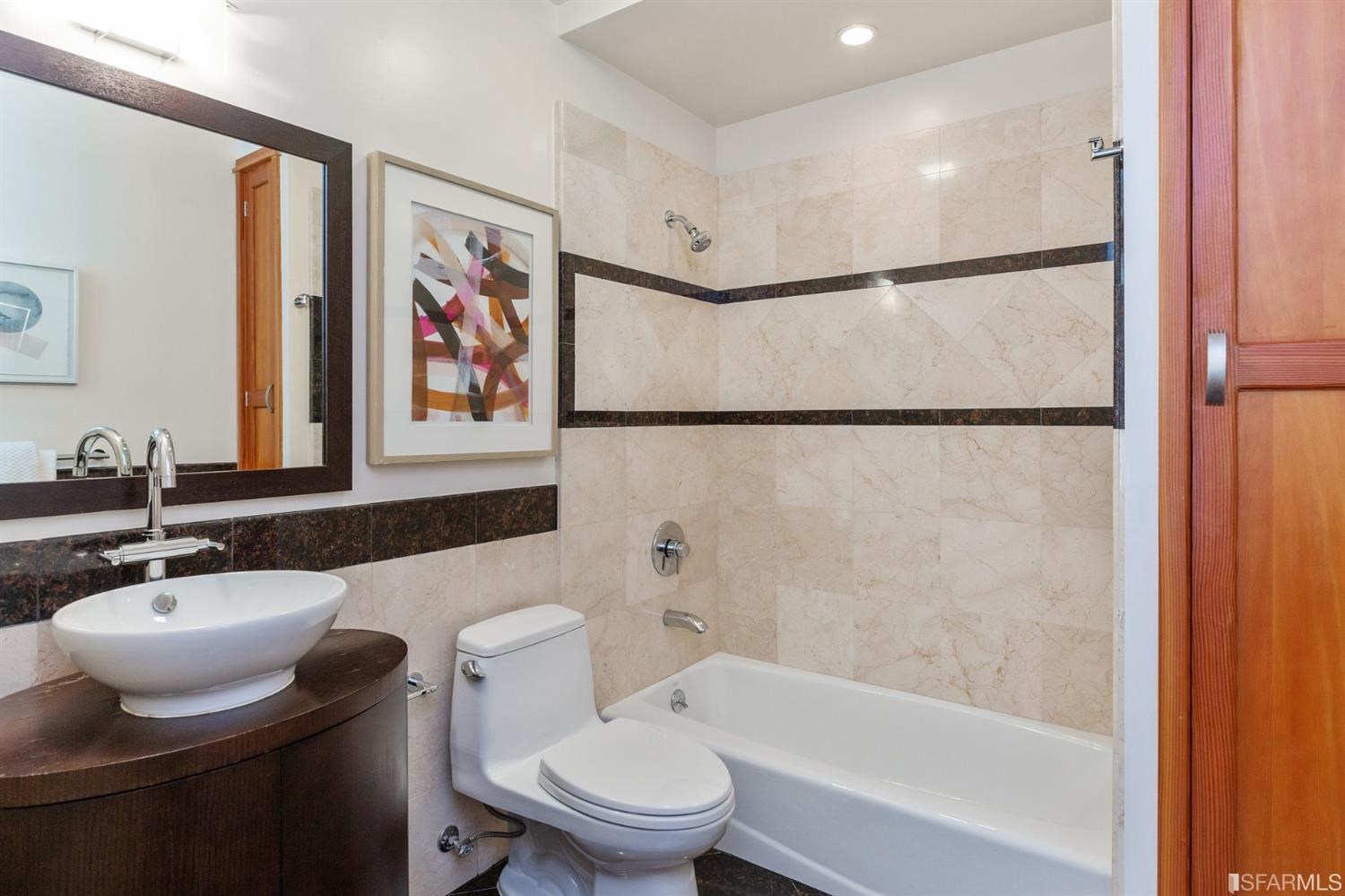 881 Corbett Avenue, Unit 3 San Francisco, CA 94131 - Photo 51 of 78 a bathroom with a sink mirror vanity and toilet