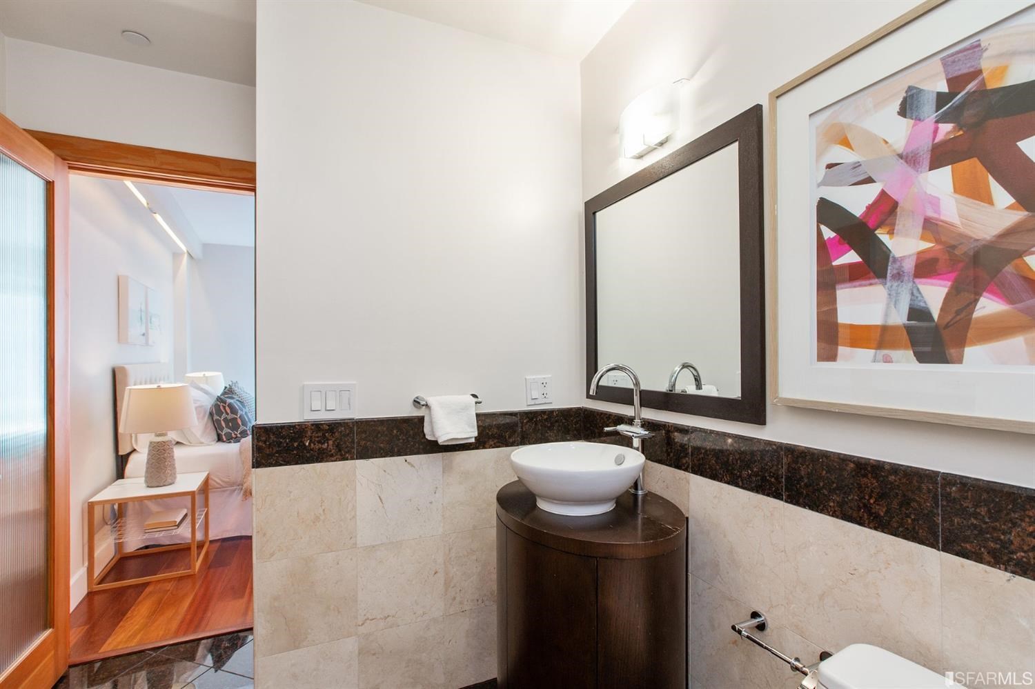 881 Corbett Avenue, Unit 3 San Francisco, CA 94131 - Photo 52 of 78 a bathroom with a sink and a mirror