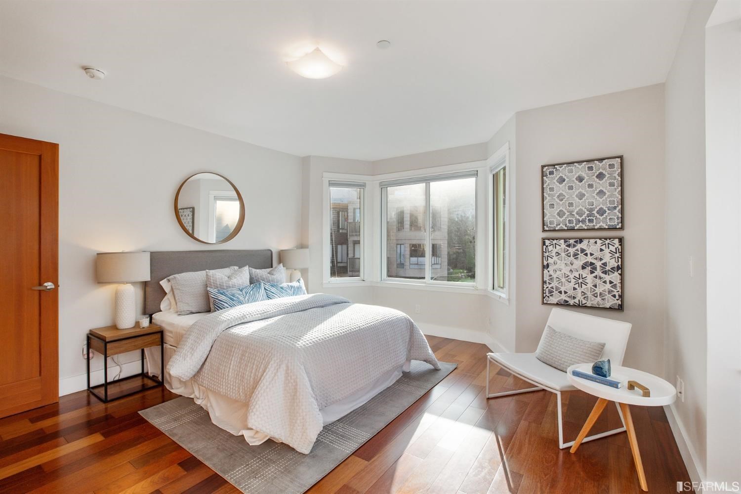 881 Corbett Avenue, Unit 3 San Francisco, CA 94131 - Photo 55 of 78 a bedroom with a bed and wooden floor