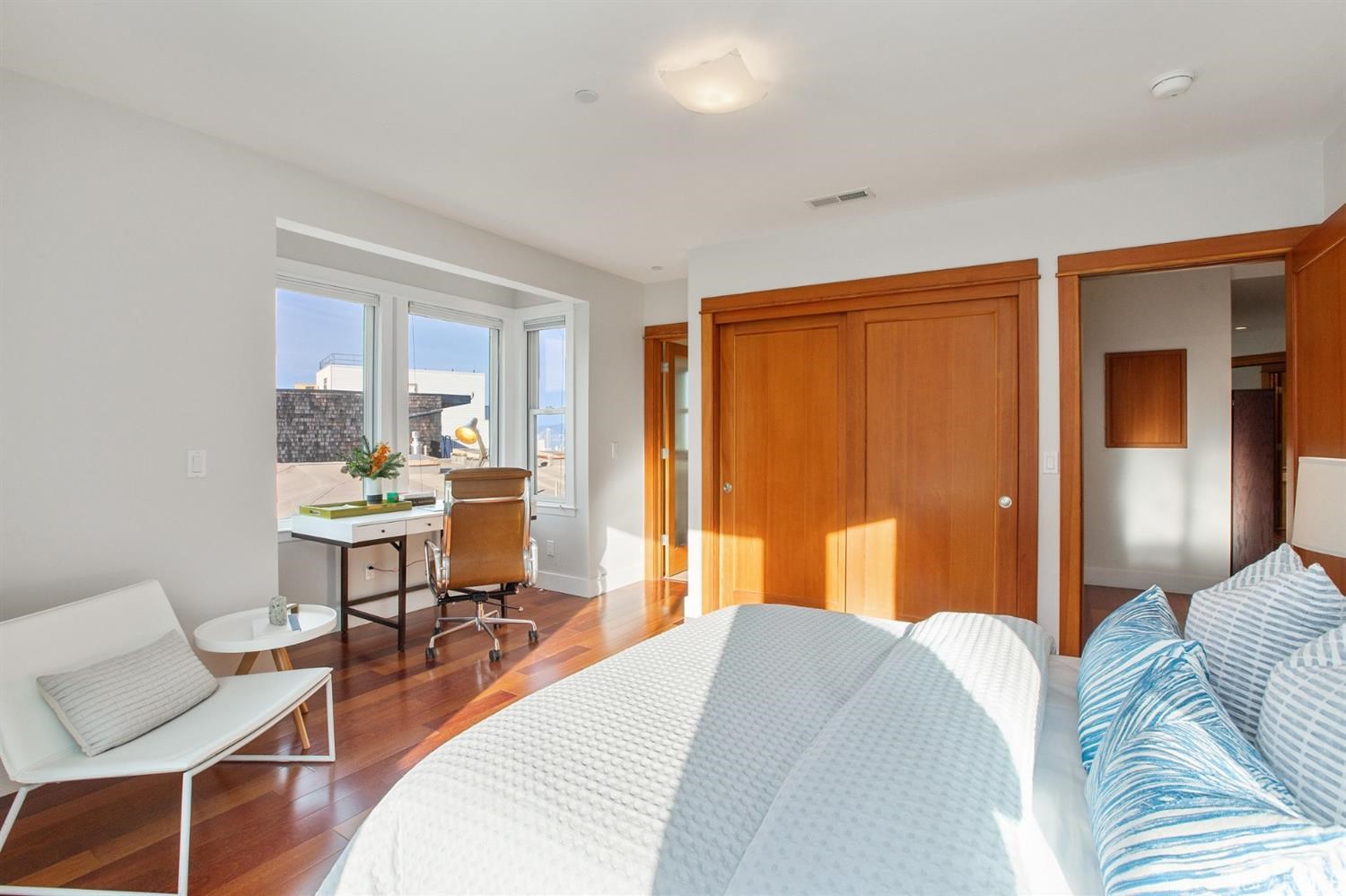 881 Corbett Avenue, Unit 3 San Francisco, CA 94131 - Photo 57 of 78 a bedroom with a bed and furniture