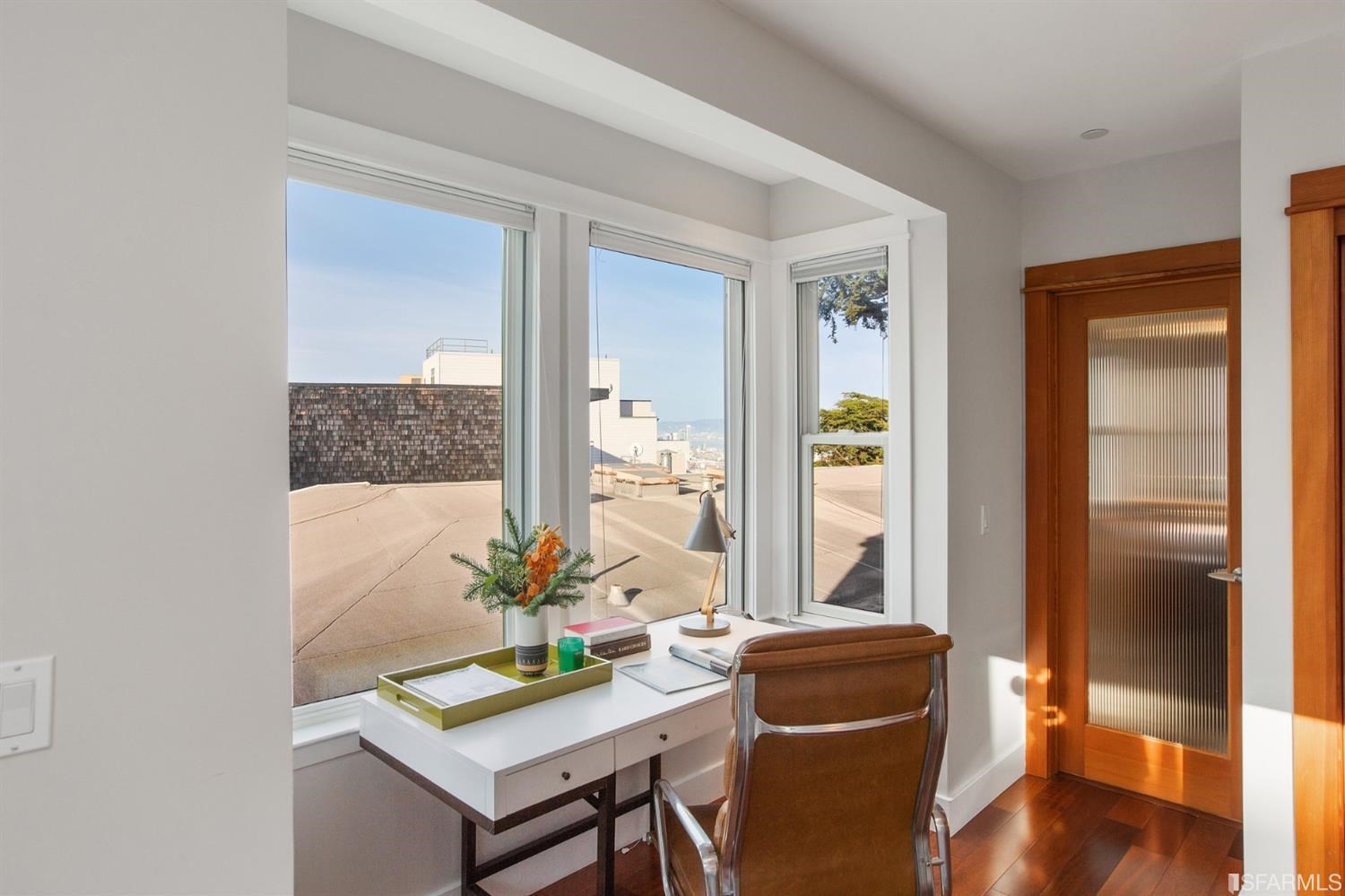 881 Corbett Avenue, Unit 3 San Francisco, CA 94131 - Photo 58 of 78 a view of a dining room with furniture window and wooden floor