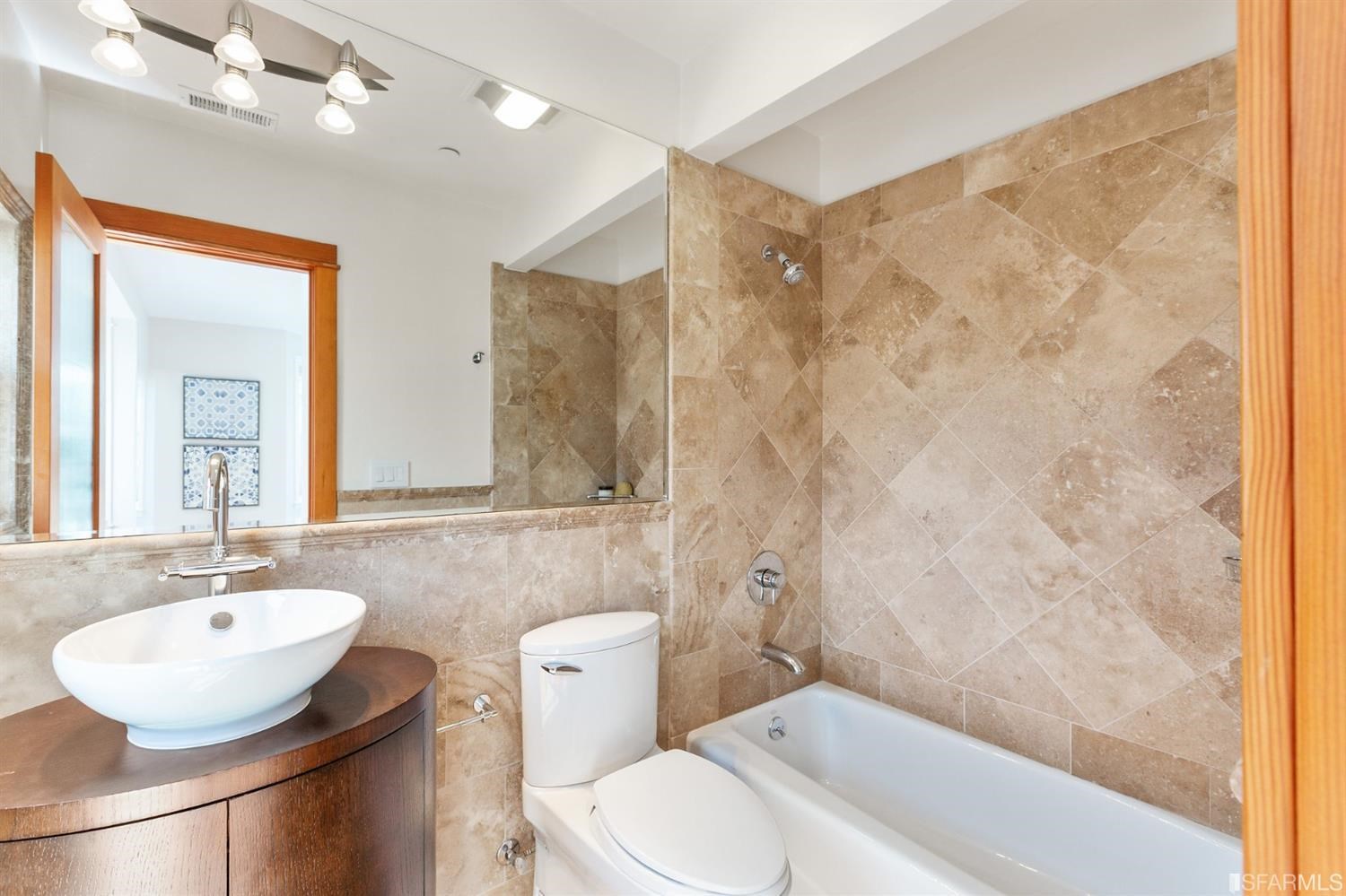 881 Corbett Avenue, Unit 3 San Francisco, CA 94131 - Photo 59 of 78 a bathroom with a sink toilet and shower