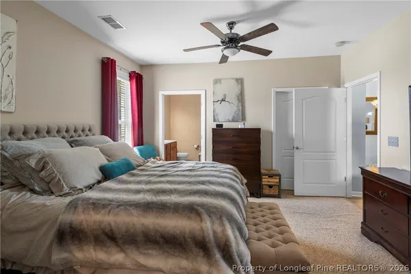 a bathroom with a tub and shower